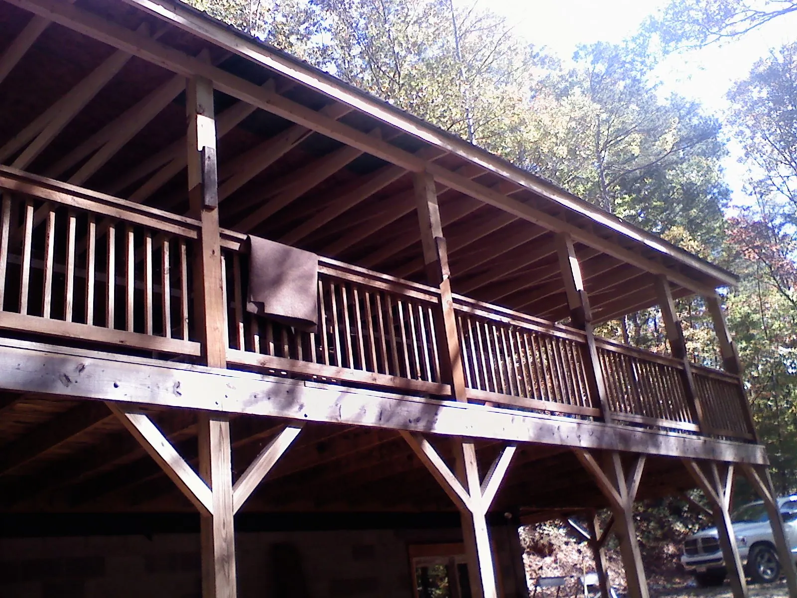 Timber framing under a new elevated porch and deck — Roof Leak Repair in Burr Hill by Roofing Brothers